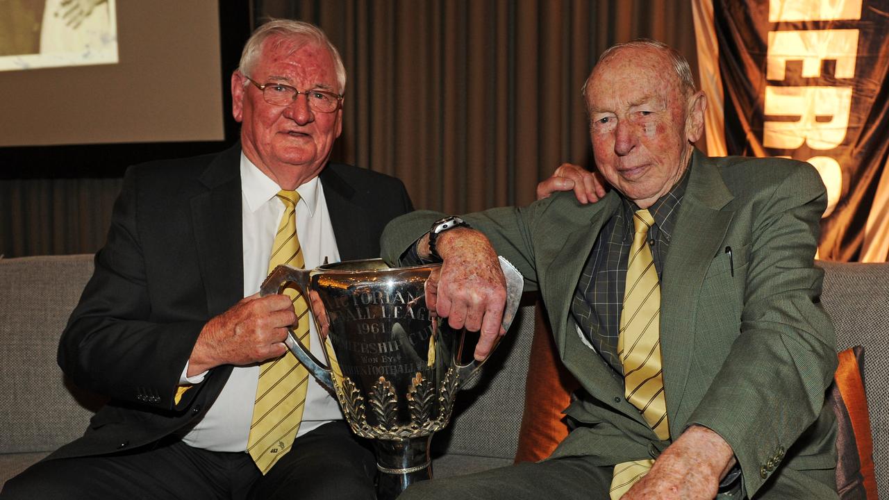 Hawthorn 1961 premiership captain Graham Arthur and coach John Kennedy with the Premiership Cup, the club’s first.