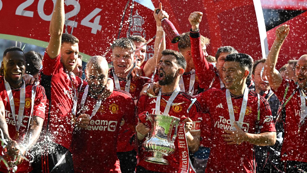 Bruno Fernandes of Manchester United lifts the FA Cup Trophy. (Photo by Mike Hewitt/Getty Images)