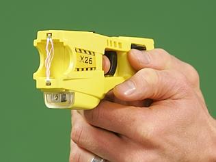  The latest Tazer stun gun being tested. Taser. 