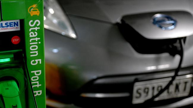 An electric car at a charging station. Picture: NCA NewsWire/Naomi Jellicoe