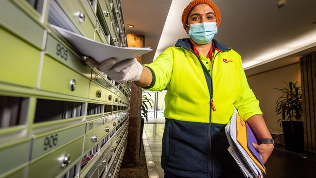 Savitha Shanabinagondikoppalu says helping people as a postie is a “really good feeling”. Picture: Jake Nowakowski