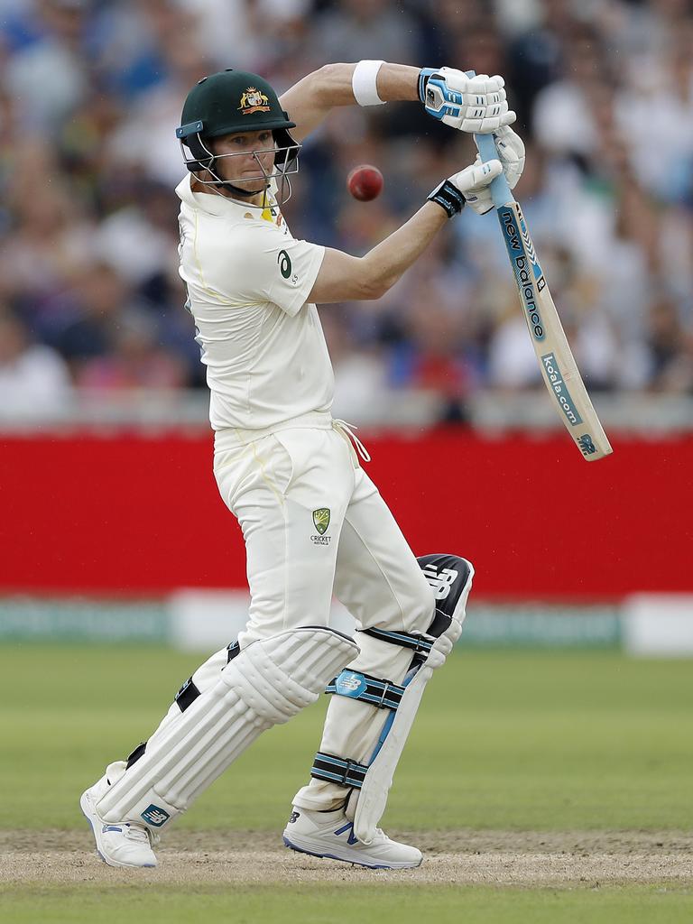 Steve Smith stands tall to guide a ball through backward point.