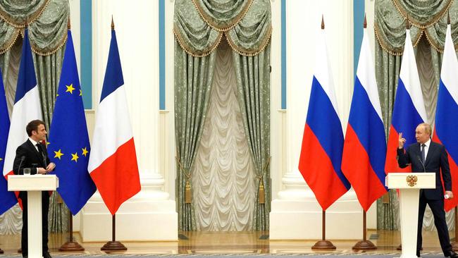 Vladimir Putin and French President Emmanuel Macron hold a joint press conference in Moscow. Picture: AFP.