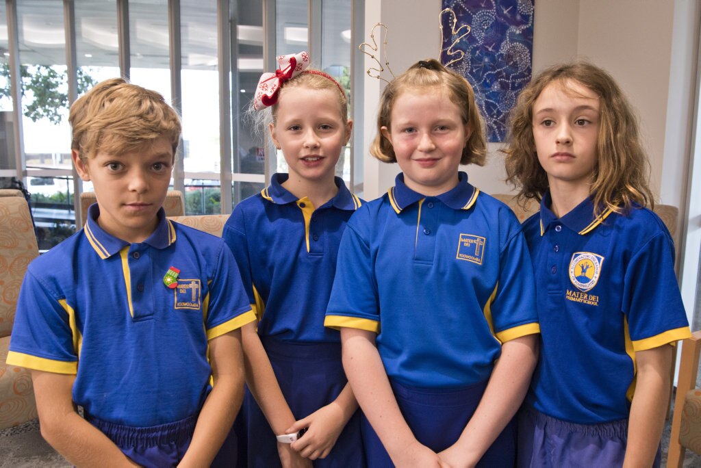 Mater Dei Primary School Yr 4 students (from left) Hamish Deuble, Millie Goldsworthy, Henrietta Cullin-Willy and Tess McLean prepare to sing Christmas carols in the wards of St Vincent's Private Hospital, Friday, November 29, 2019. Picture: Kevin Farmer