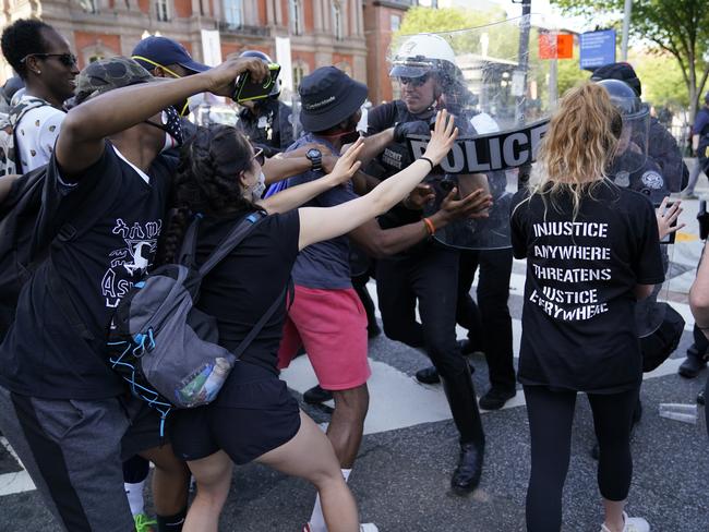 Demonstrators clash with police near the White House over the death of George Floyd. Picture: AP