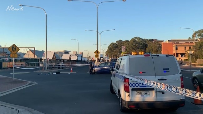 An armed man has been shot by police at Campbelltown train station