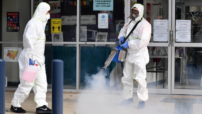 Deep cleaners at St Charles Catholic Primary School at Waverly in eastern Sydney on Wednesday. Picture: Joel Carrett