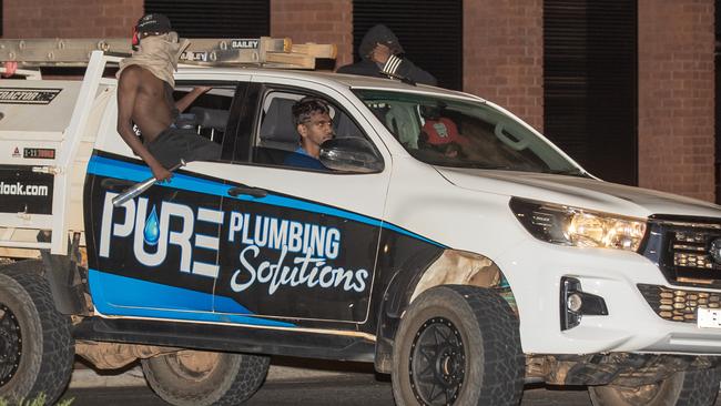 Youths in Alice Springs drive a stolen Toyota HiLux through town at 4am. Picture: Liam Mendes