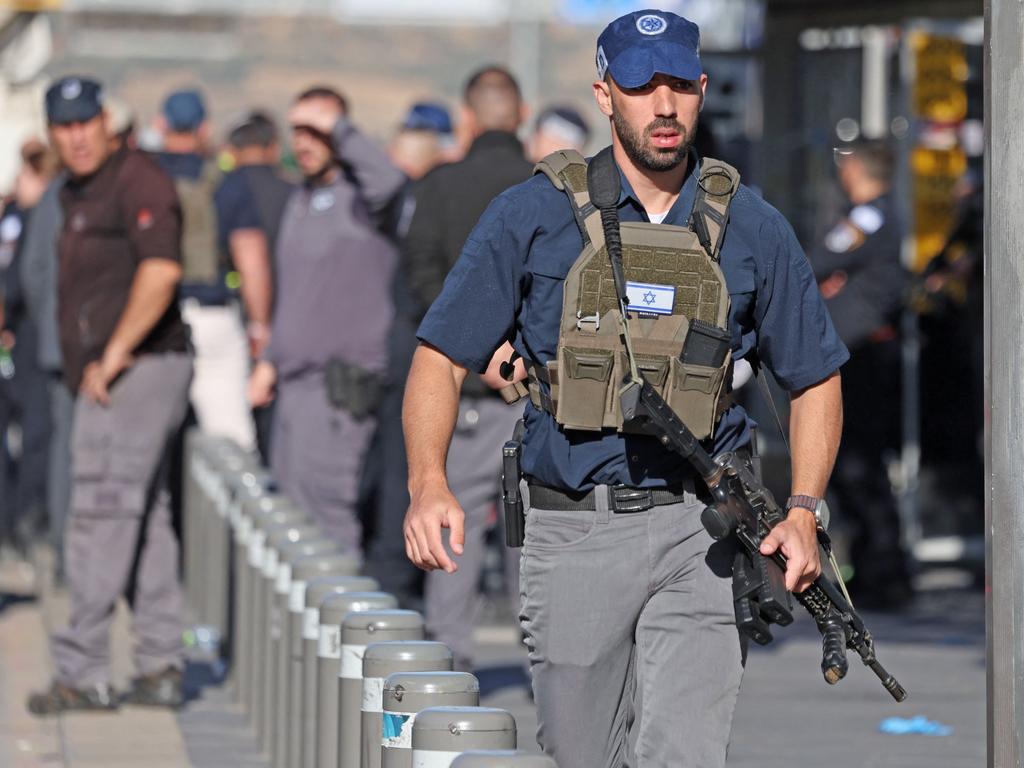 Israeli security forces at the scene of a shooting attack in Jerusalem. Picture: Ahmad Gharabli/AFP