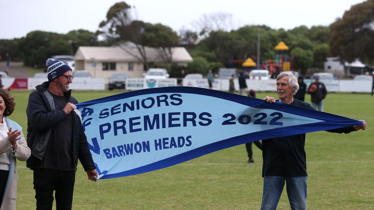 Barwon Heads unfurl their 2022 premiership pennant. Picture: Mike Dugdale