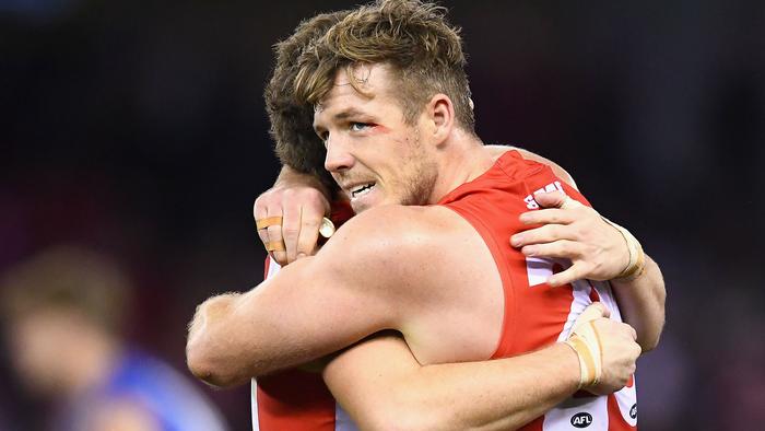 MELBOURNE, AUSTRALIA - JULY 15:  Tom Papley and Luke Parker of the Swans celebrate winning the round 17 AFL match between the North Melbourne Kangaroos and the Sydney Swans at Etihad Stadium on July 15, 2018 in Melbourne, Australia.  (Photo by Quinn Rooney/Getty Images)