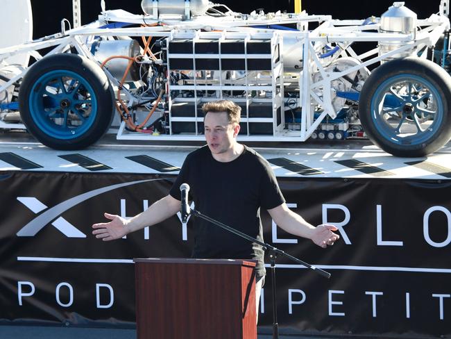 Elon Musk speaks to participants ahead of testing of their pods in the SpaceX Hyperloop competition. Picture: Gene Blevins