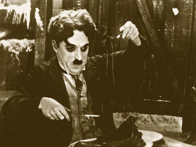 Actor Charlie Chaplin in scene from film "Gold Rush"./Films/Titles/Gold/Rush