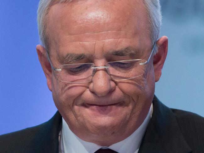 (FILES) This file photo taken on March 13, 2014 shows Martin Winterkorn, then CEO of German carmaker Volkswagen (VW), attending the company's annual press conference in Berlin. Volkswagen's former boss Martin Winterkorn is under investigation for having allegedly manipulated the market by holding back information about emissions cheating at the automobile giant, German prosecutors said June 20, 2016. / AFP PHOTO / JOHANNES EISELE