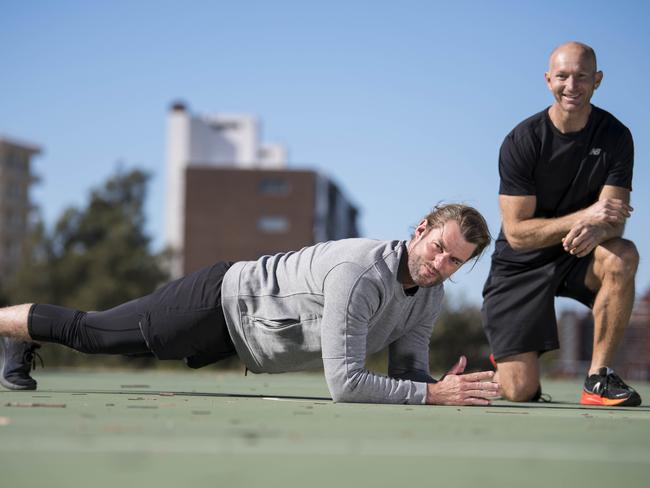 Ash Williams works out with Adam MacDougall. Picture: Darren Leigh Roberts