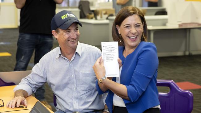 Queensland opposition leader Deb Frecklington votes with husband Jason at Oonooba State school in the electorate of Mundingburra today. Picture: NCA NewsWire / Sarah Marshall