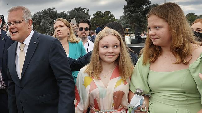 Lily, centre, and Abigail Morrison accompany their father. Picture: Gary Ramage