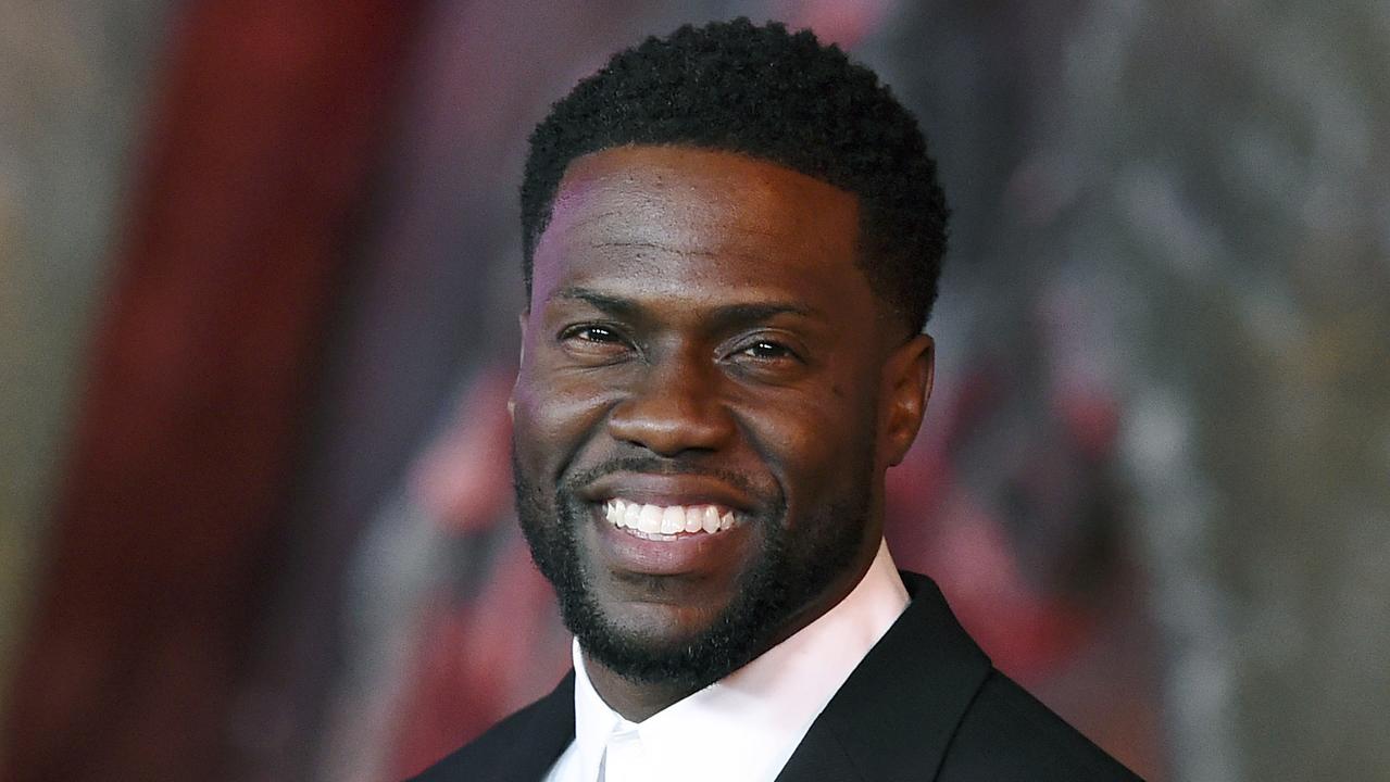 FILE - In this Dec. 11, 2017 file photo, Kevin Hart arrives at the Los Angeles premiere of "Jumanji: Welcome to the Jungle" in Los Angeles. Hart on Thursday night, Dec. 6, 2018, announced he was bowing out of hosting the 91st Academy Awards, after public outrage over old anti-gay tweets reached a tipping point. (Photo by Jordan Strauss/Invision/AP, File)