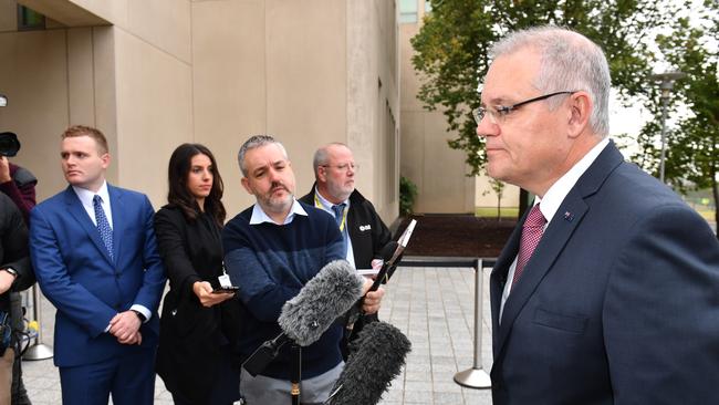 Scott Morrison talks to journalists ahead of the budget. Picture; AAP.