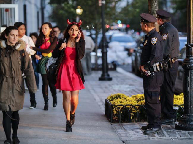 Students from Stuyvesant high school are evacuated after a man driving a rental truck struck and killed eight people. Picture: Getty