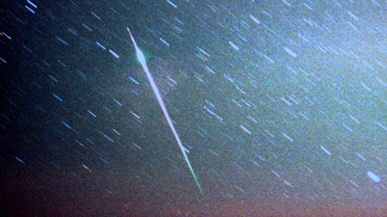 A meteor streaks across the sky. Picture: Martin George
