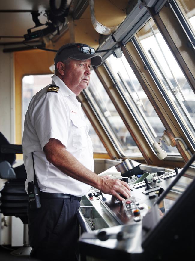 Barnett steers the ferry through the harbour. Picture: Sam Ruttyn