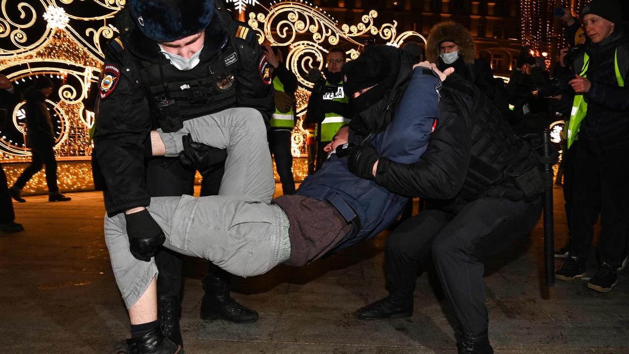 Police officers detain a man during a protest in Moscow. Picture: AFP