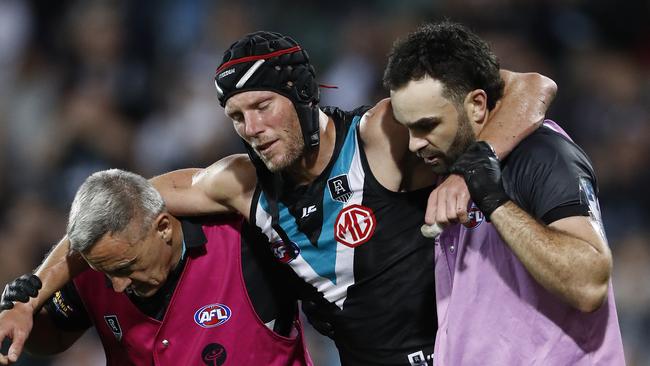 Brad Ebert is taken from the ground after suffering a concussion. Picture: Getty Images