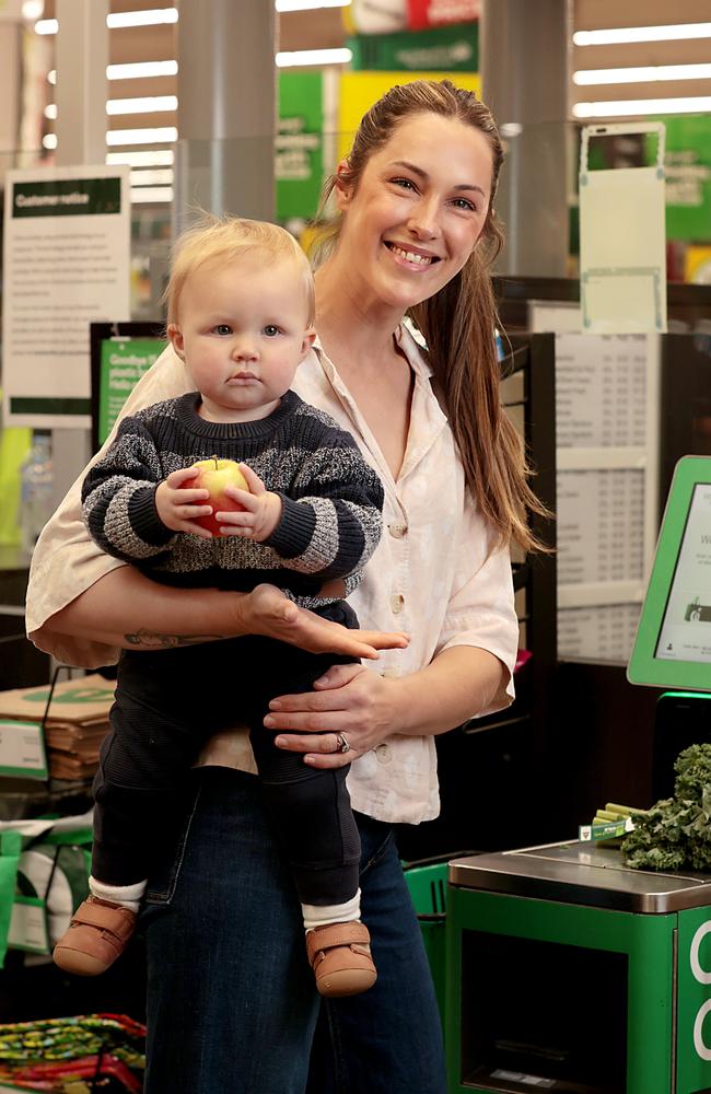 Sydney mum-of-two Beth Robertson, pictured with her son Max, 1, says the kids’ confectionery-free check-outs will make her grocery shopping less stressful. Picture: Jane Dempster