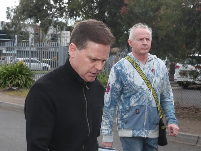 Danny Nikolic and Pat Lennon leaving Broadmeadows Magistrates’ Court earlier this year. Picture: David Crosling
