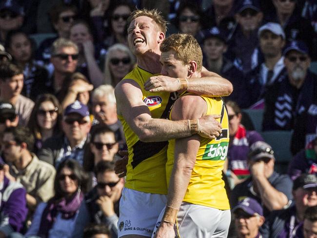 Jacob Townsend of Richmond  celebrates a goal during the round 22 AFL match between the Fremantle Dockers and the Richmond Tigers at Domain Stadium in Perth, Sunday, August 20, 2017. (AAP Image/Tony McDonough) NO ARCHIVING, EDITORIAL USE ONLY