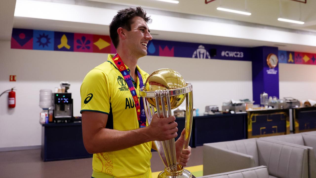 AHMEDABAD, INDIA - NOVEMBER 19: Pat Cummins of Australia poses with the ICC Men's Cricket World Cup Trophy following the ICC Men's Cricket World Cup India 2023 Final between India and Australia at Narendra Modi Stadium on November 19, 2023 in Ahmedabad, India. (Photo by Robert Cianflone/Getty Images)