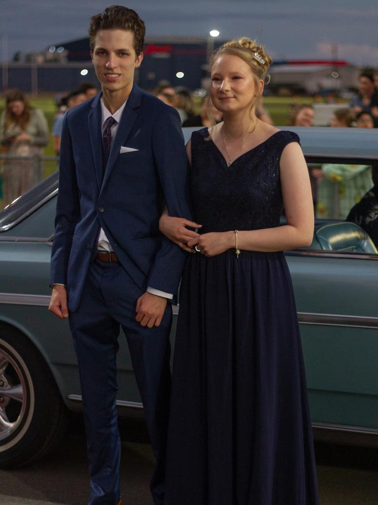 Brayden Chapman and Natasha Jefferson arrived in a 1964 AMC Rambler Classic.