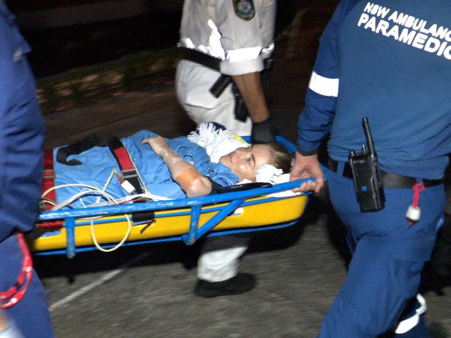 Paramedics take Lauren O’Neill to hospital after she was bitten. Picture: On Scene Bondi