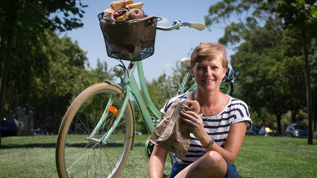 12/1/16 Peggy Byrne with products from Enjoy bakery in Norwood promoting the "crawl" that follows the Bupa challenge route - Bakeries along the route have special bags documenting the tour route (created especially for the Santos Tour Down Under) highlighting delicious stops in each township.Picture by Matt Turner.