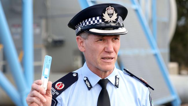 Acting Assistant Commissioner Christopher Stream with a new cocaine drug testing device. Picture: Steve Pohlner