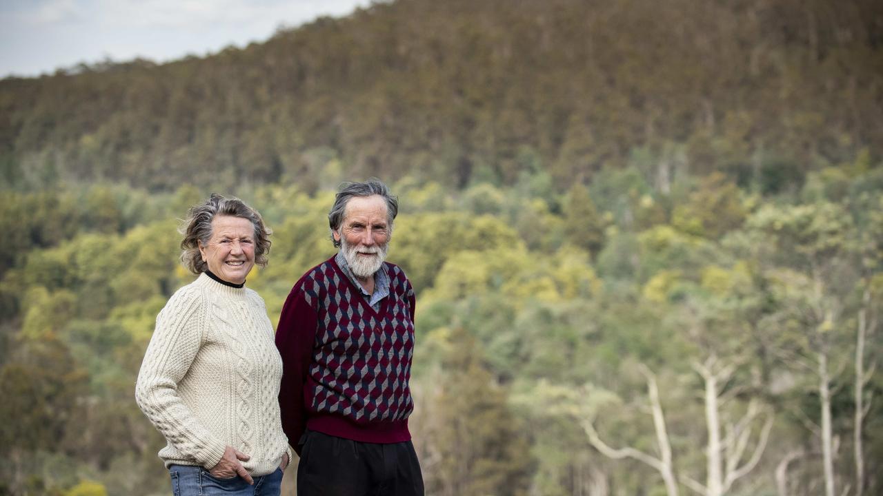 <p>Bob Graham and Trish Baily overlooking the Mount Koonya State Forsest on the Tasman Peninsula in September, 2019. MATHEW FARRELL/The Australian</p>