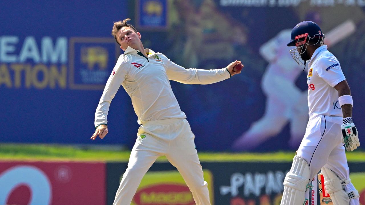 Matthew Kuhnemann bowls during the fourth day of the second Test cricket in Galle. (Photo by Ishara S. KODIKARA / AFP)