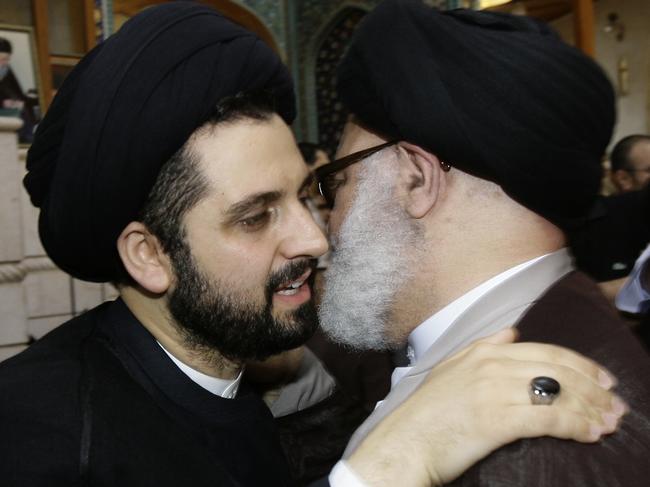 Sayyed Jaafar Fadlallah, left, son of Grand Ayatollah Sayyed Mohammed Hussein Fadlallah, receives condolences after the death of his father in Beirut. Picture: AFP