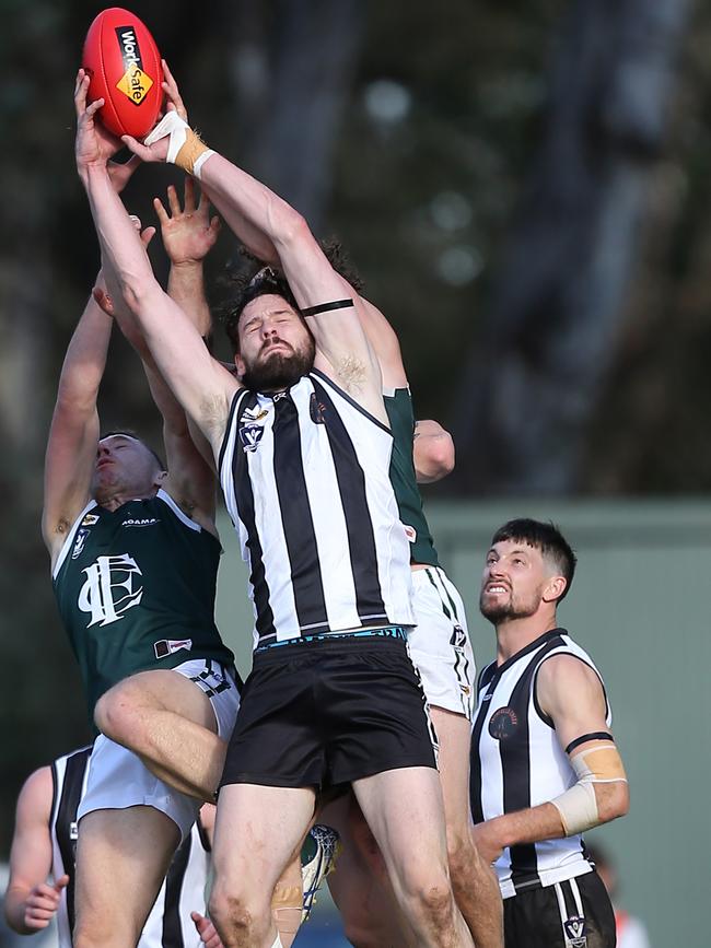 Euroa’s Andrew Smith marks in front of the pack.