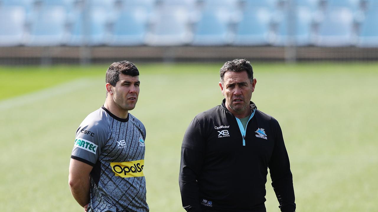 Coach Shane Flanagan and Michael Ennis during Cronulla Sharks training at Southern Cross Group Stadium, Cronulla. Picture: Brett Costello