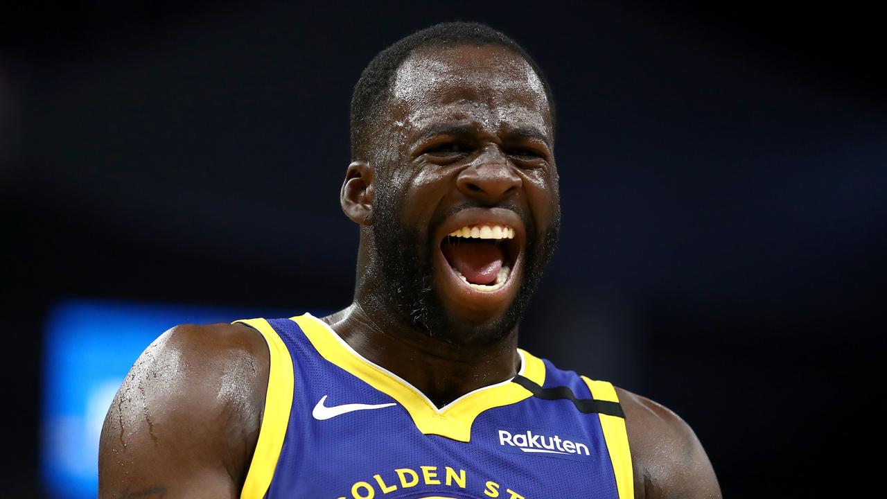 Draymond Green has been fined under anti-tampering rules following his remarks about Phoenix Suns ace Devin Booker. (Photo by EZRA SHAW / GETTY IMAGES NORTH AMERICA / AFP)