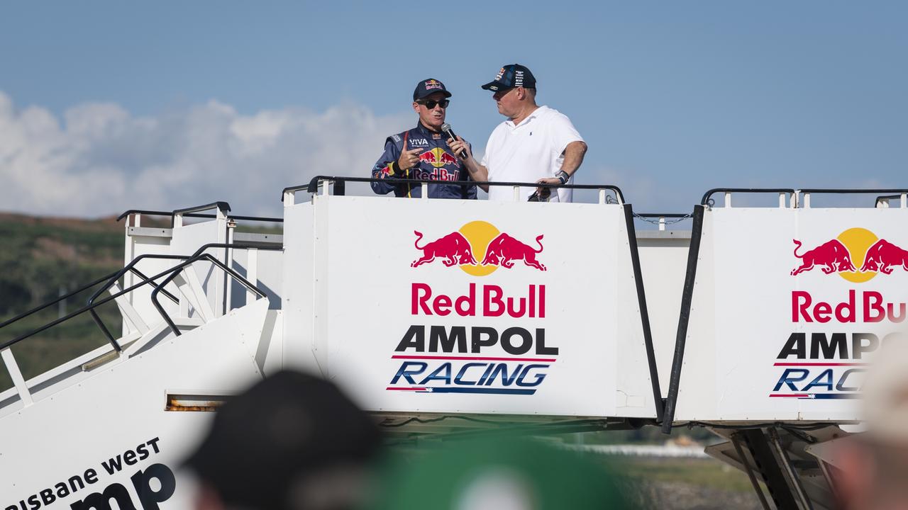 Red Bull pilot Matt Hall (left) after thrilling the crowd with an aerobatic display as V8 Supercars team Red Bull Ampol Racing launch their 2024 livery at Toowoomba Wellcamp Airport, Saturday, February 3, 2024. Picture: Kevin Farmer