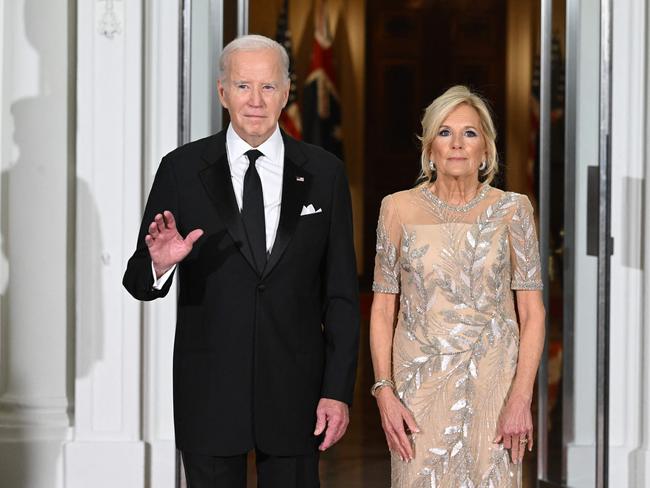 The presidential couple on the steps of the White House. Picture: AFP