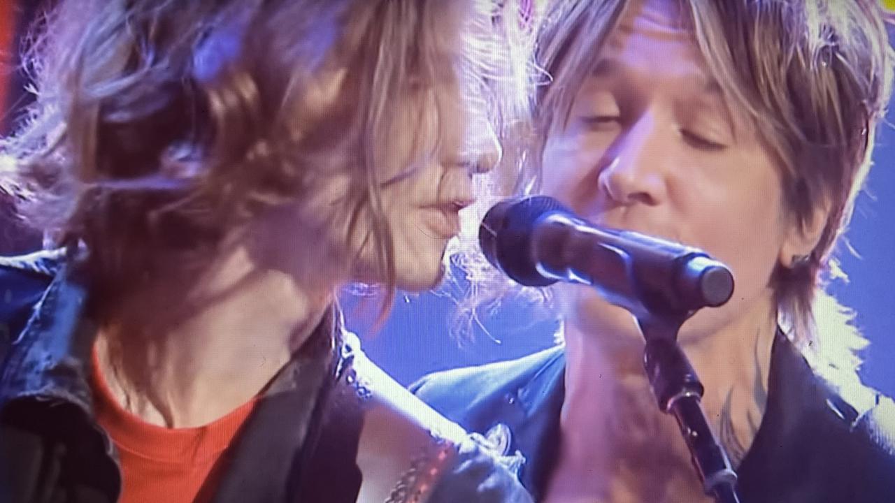 Freddie Bailey singing with Keith Urban, his country music idol, while a contestant on reality show The Voice. Picture: Supplied