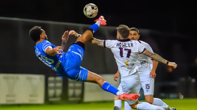 Northcote City's Devin O'Hea scores with a bicycle kick. Picture: Marcusr Photography