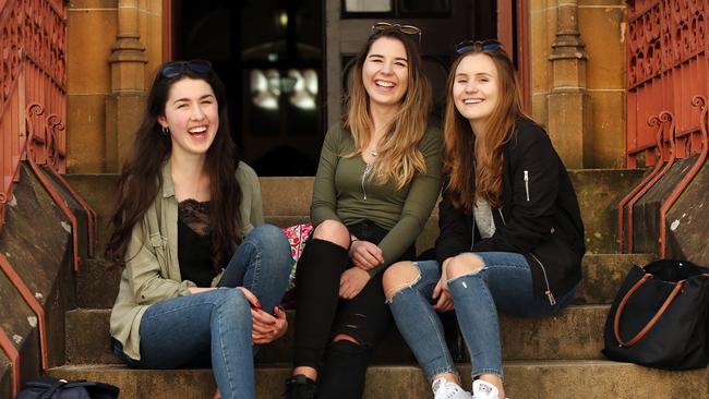 Teenage university students Alice Roberts, Tabitha Lepp and Gabi Mikolayczat. Ms Roberts said teenagers were keen to secure indepdence. Picture: Richard Dobson