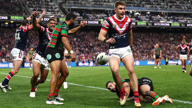 Paul Momirovski celebrates scoring a try during the preliminary final against South Sydney.