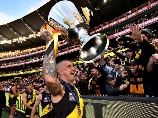 Richmond's Dustin Martin celebrates with the Premiership Cup after the Tigers defeated the GWS Giants in the 2019 AFL Grand Final at the MCG. Picture: Phil Hillyard