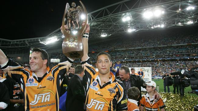 Mark O'Neill and Benji Marshall hold the trophy in victory. Picture: Gregg Porteous